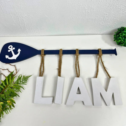 Decoración Personalizada con Remo y Letras Colgantes